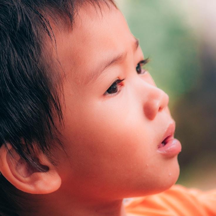 Kaveri Mehta, Lead Design Curator at Murmur Stone Atelier, reviewing corporate floral arrangements